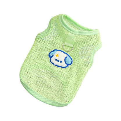 Light green mesh pet vest with an embroidered dog logo and D-ring for leash attachment
